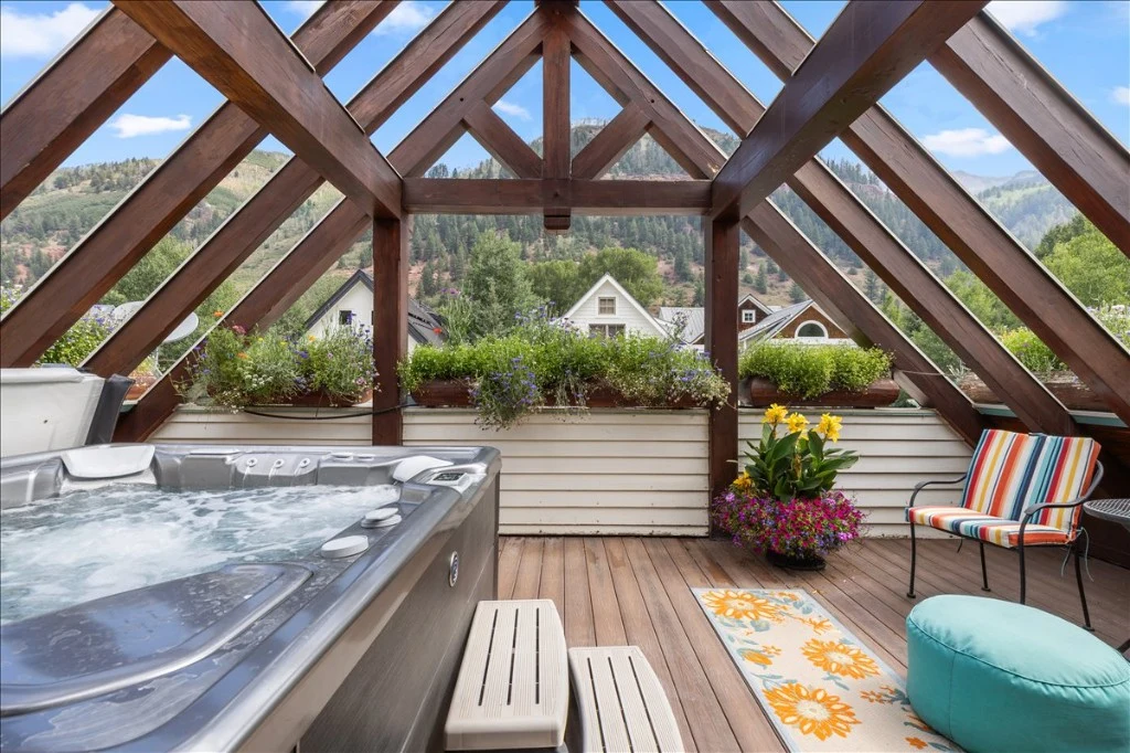 Hot tub on the deck with mountain views